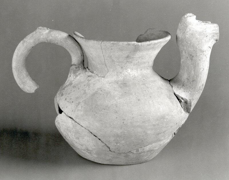 Beak-spouted jug