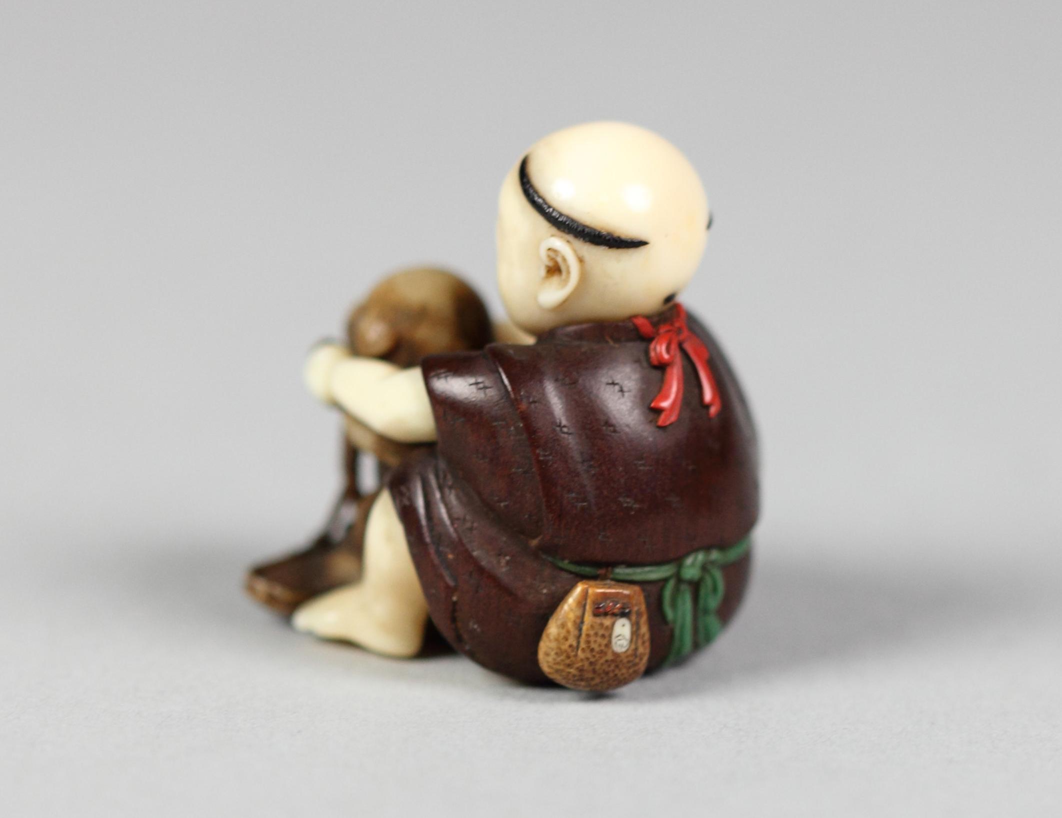 Netsuke of Boy Playing with a Dog, Image 2/2