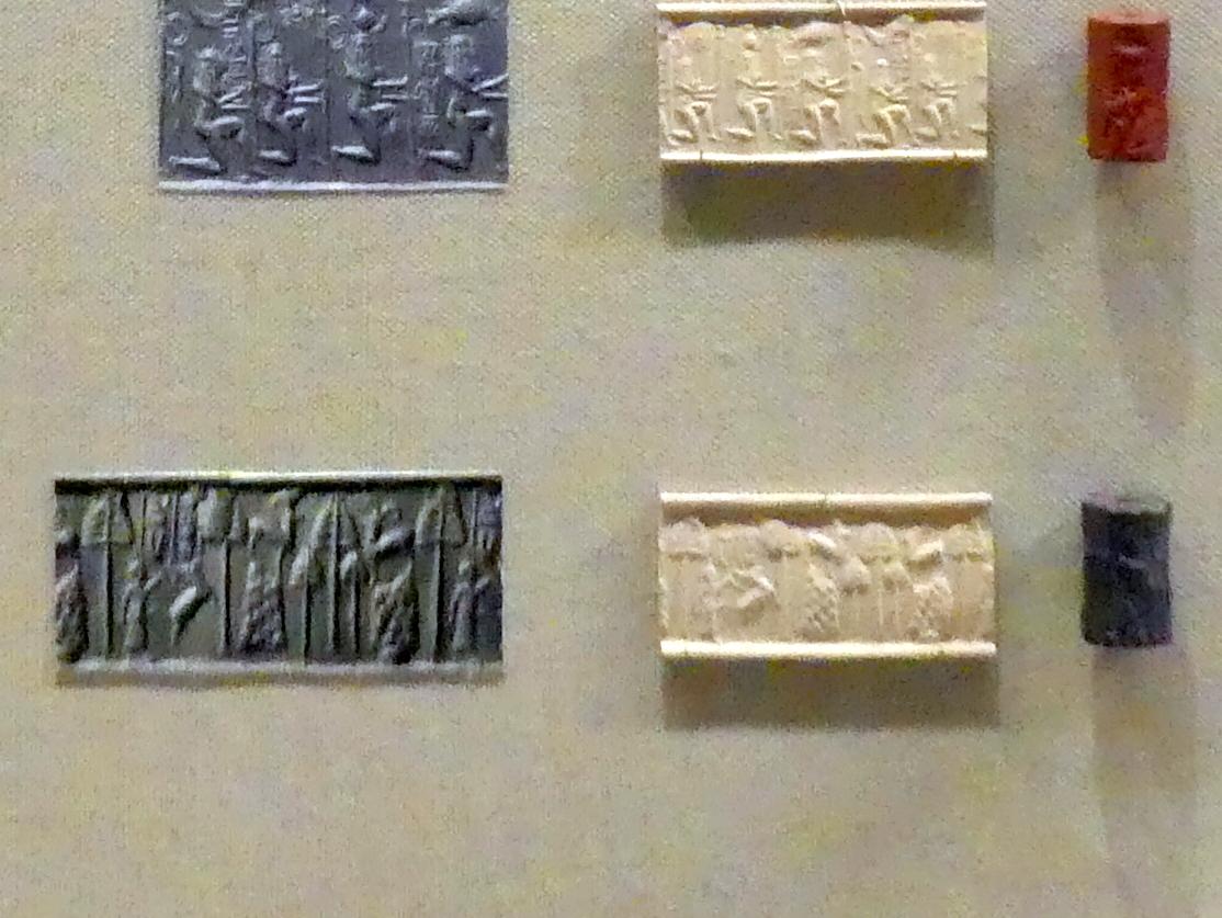 Rollsiegel mit moderner Abrollung: Jagdszene, Akkadzeit, 2350 - 2150 v. Chr., 2250 - 2150 v. Chr., Bild 1/2