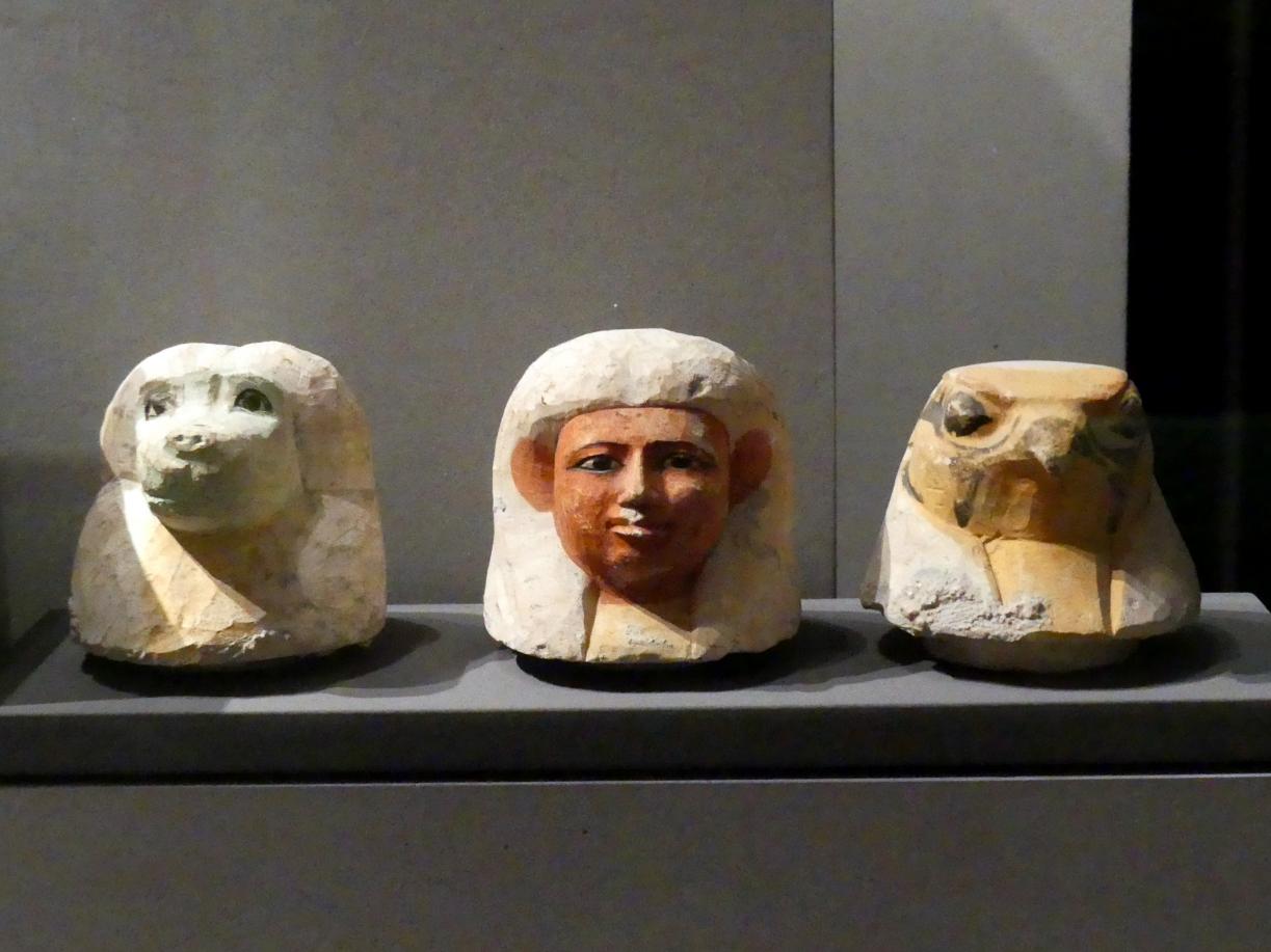 Drei Deckel von Eingeweidekrügen (Kanopen) in Gestalt der Horussöhne, 18. Dynastie, Undatiert, 1500 v. Chr.