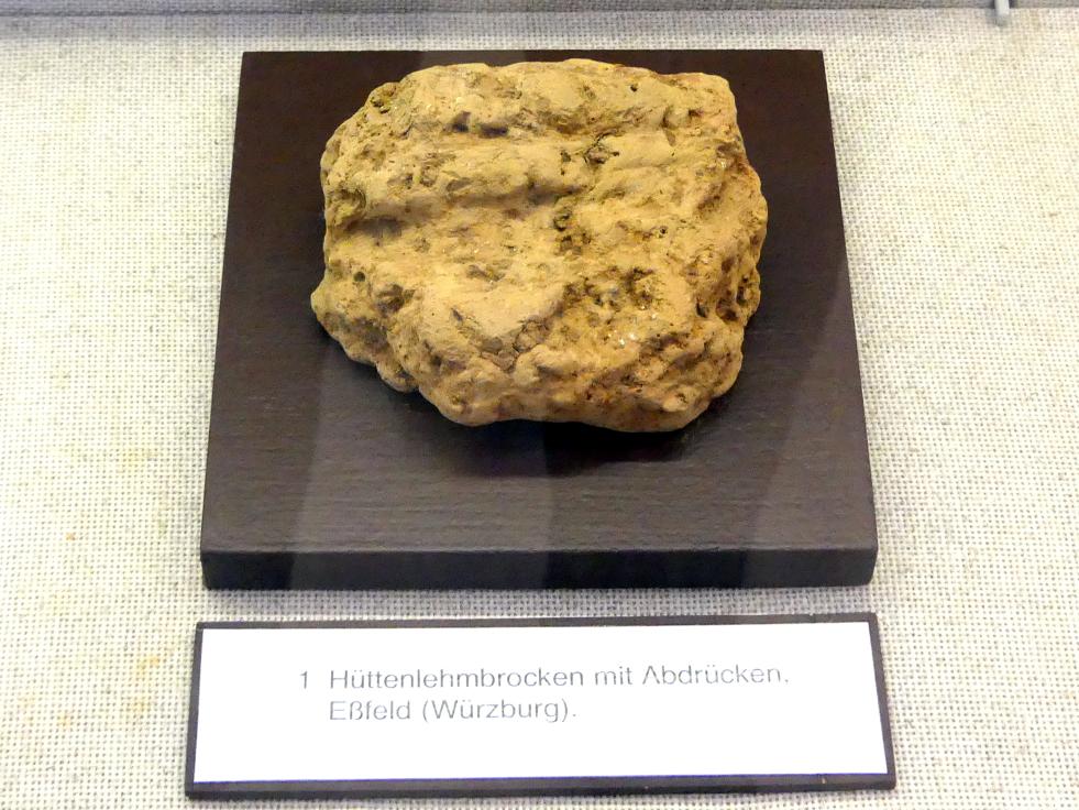 Hüttenlehmbrocken mit Abdrücken, Neolithikum (Jungsteinzeit), 5500 - 1700 v. Chr.